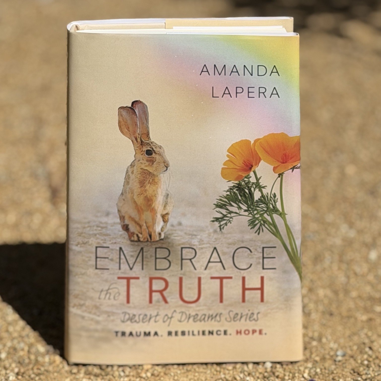 Embrace the Truth posed on dirt.